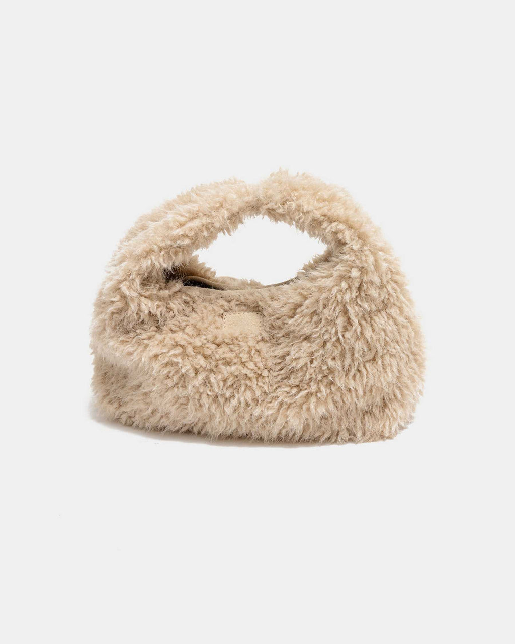 Fabienne Faux Fur -laukku pehmeällä tekoturkispinnalla, irrotettavalla olkahihnalla ja kullanvärisellä ketjulla. Saatavana kolmessa värissä.