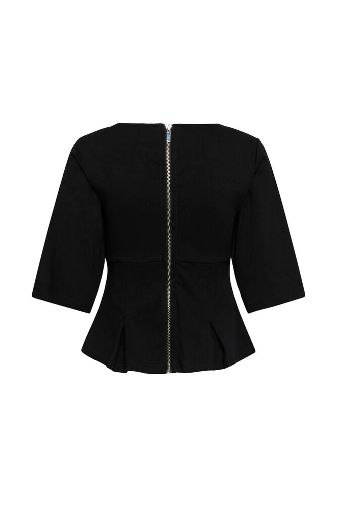 Co'Couture Sculpted Peplum Top on vartaloa myötäilevä peplum-pusero. Muotoon ommellut saumat, joustava puuvilla ja ajaton tyyli arkeen sekä juhlaan.