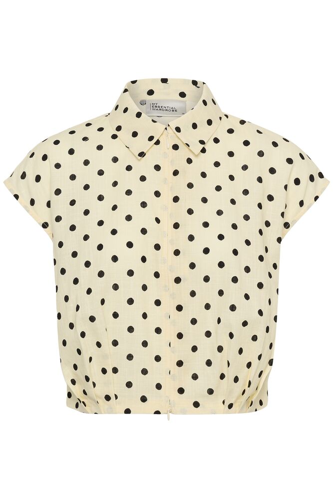 Lyhyt / boximallinen naisten puuvillainen paita, lyhythiha/ hihaton malli. Pallokuosi tuo trendikkyyttä asuun.