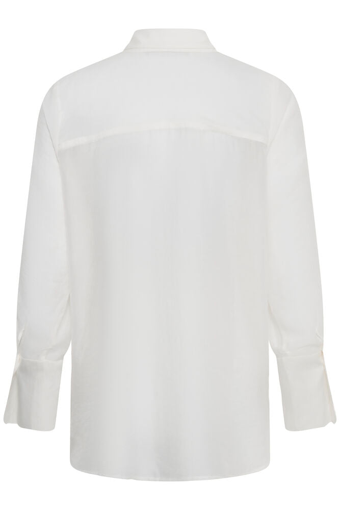 MWSmilla Oversize Shirt on kevyt ja läpikuultava oversize-paitis. Etupuolen tuplakangas lisää peittävyyttä, ja paitis toimii hyvin kerrostettuna.