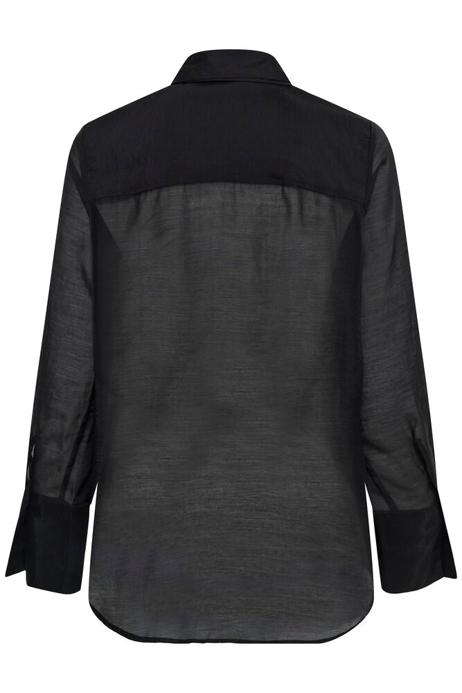 MWSmilla Oversize Shirt on kevyt ja läpikuultava oversize-paitis. Etupuolen tuplakangas lisää peittävyyttä, ja paitis toimii hyvin kerrostettuna.
