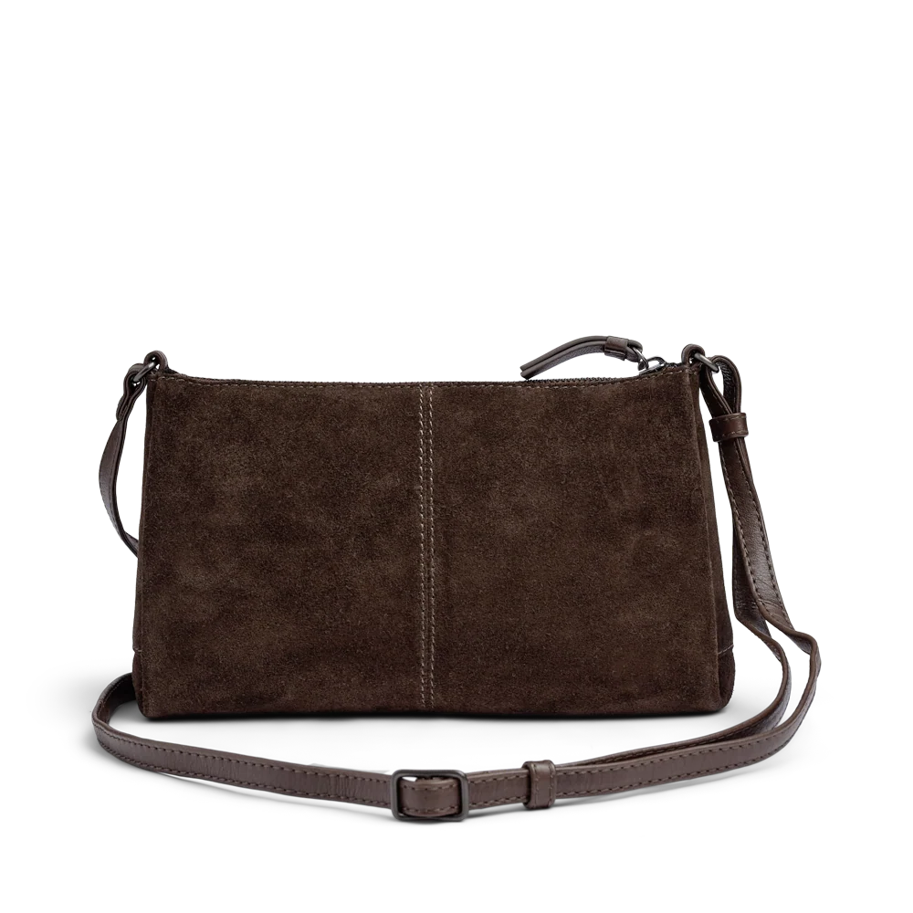 Markberg MarciMBG on kompakti tummanruskea mokkalaukku säädettävällä crossbody-hihnalla. Vetoketjukiinnitys ja sisätasku pitävät tärkeät tavarat mukana.