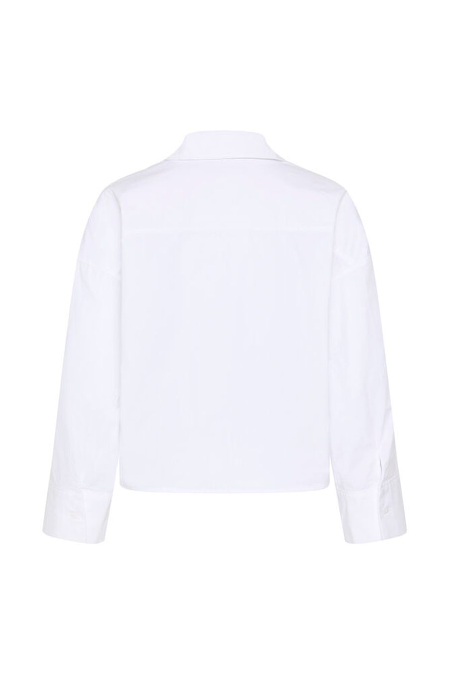 My Essential Wardroben suosittu boxy-mallinen paitis nyt raikkaan valkoisena. Tämä jakkumainen paita on valmistettu tukevasta luomupuuvillasta, joka antaa ryhtiä mutta tuntuu silti miellyttävältä päällä.