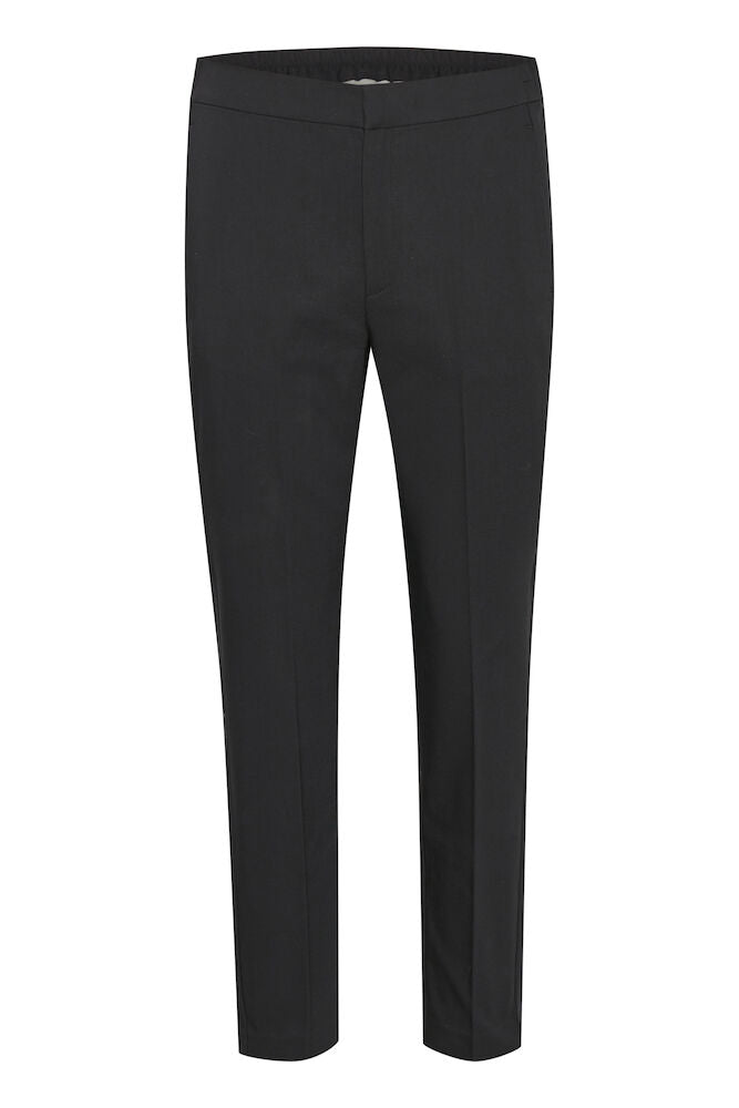 ZellaIW Flat Pant -housut suorilla lahkeilla, joustavalla vyötäröllä ja vajaamittaisella pituudella. Mukava puuvilla- ja kierrätyspolyesterisekoitus.