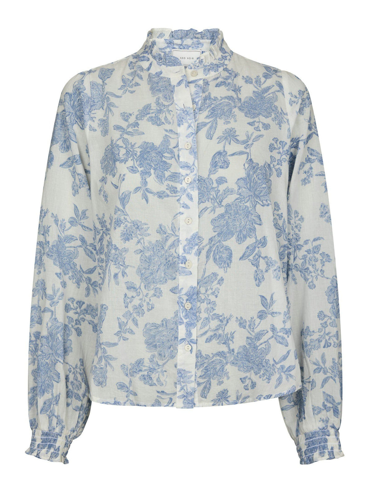 Valkoinen Oda Flower Spring Shirt utuisensinisin kukin ja kauniilla kirjailulla. 100 % puuvillaa. Helppo yhdistää arkeen ja juhlavampaan tyyliin.
